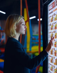 Cielo SmartSigns Woman Selecting Food at Rampoline Park